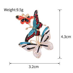 Three-layered enamel butterfly brooch with rhinestones, 4.3cm height and 3.2cm width