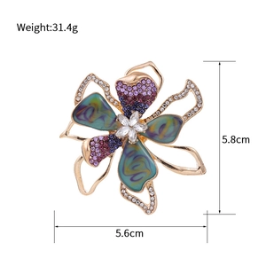 Elegant flower brooch with faux abalone shell petals and rhinestones, 5.6cm x 5.8cm size