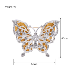 Vintage butterfly brooch with double-layer crystals and silver plated hollow metal frame