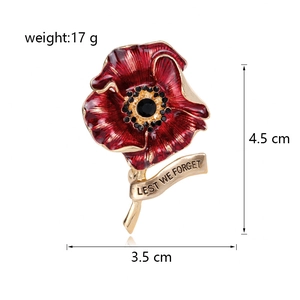 Rote Mohnblumenbrosche mit Lest We Forget Bandschleife für feierliche Gedenkanlässe