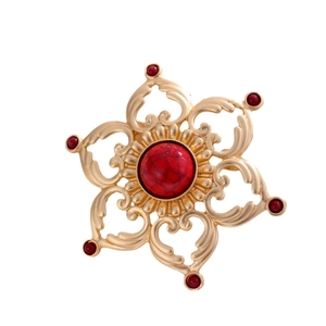 Broche lotus vintage dorée avec pierre de marbre rouge et design floral en étoile