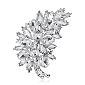 Silver-tone leaf brooch featuring sparkling crystals and rhinestones for elegant styling