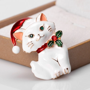 Cute Christmas cat brooch with red hat and green holly leaves on jewelry box base