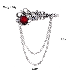 Vintage alloy pin brooch with red gemstone, white pearls and double hanging tassel chains