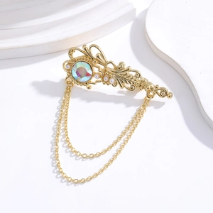 Vintage gold brooch with colorful rhinestone, pearls and double chain decoration