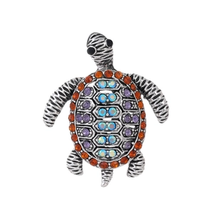 Vintage sea turtle brooch with colorful rhinestones on polished silver metal base