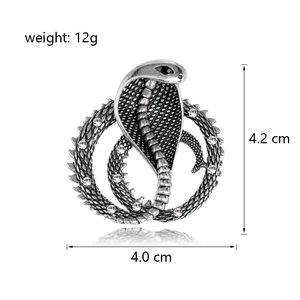 Vintage cobra snake brooch with crystals and black eyes in antique silver finish