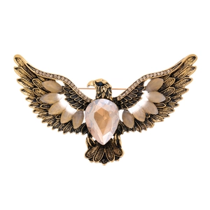 Vintage eagle brooch in antique gold with champagne gemstone and faceted crystal details