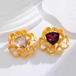 Matte gold camellia brooches with champagne and purple triangular gemstone crystals