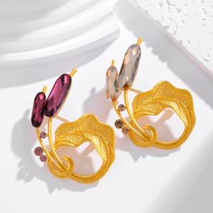 Artistic gold-plated leaf brooches with amber and purple crystal waterdrop accents