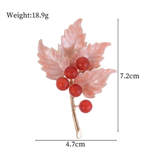 Elegant maple leaf brooch with pink enamel leaves, red berries, and size measurements