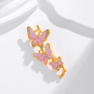 Spilla vintage farfalla in smalto rosa con ramo dorato e cristalli lucenti