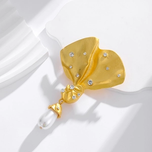 Vintage gold pleated bow brooch with sparkling zircons and a white drop pearl pendant