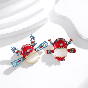 Traditional Chinese Opera style brooch with red enamel and white opal stone accent