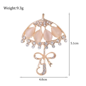 Opal umbrella brooch with pink stones, rhinestones and bowknot on gold-tone metal
