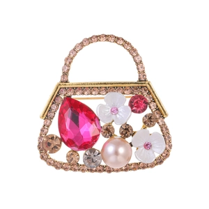 Exquise vintage handtas broche met champagne strass, roze kristal en parel accenten op goud