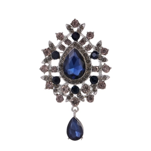 Spilla vintage stile palazzo con cristallo a goccia blu scuro e nappe d'argento