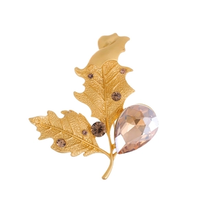 Vintage golden maple leaf brooch with champagne crystals and teardrop gemstone