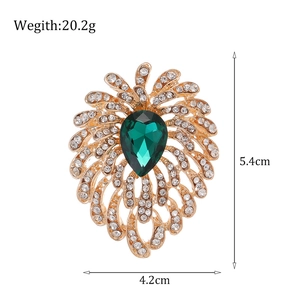 Vintage gold peacock brooch with emerald crystal and rhinestones, size 5.4cm x 4.2cm