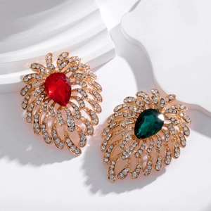 Elegant gold feather brooches with red and green pear-shaped crystals and white rhinestones