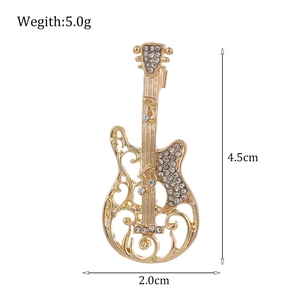 Exquisite gold guitar brooch with sparkling white rhinestones for elegant suit accessories