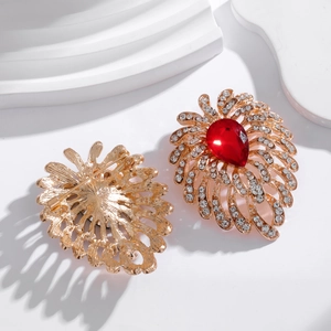 Vintage gold peacock brooch with red water-drop gemstone and white crystal inlay