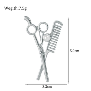 Barber tools brooch featuring silver scissors and comb with white pearl inlay, 5.0cm height