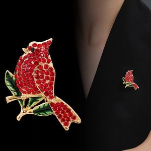 Luxury cardinal bird brooch with red rhinestones and green enamel on gold metal branch