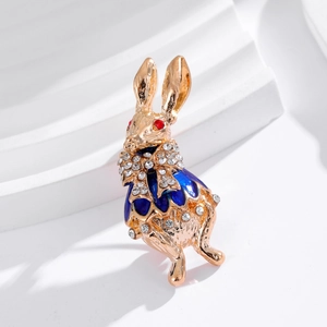 Golden bunny brooch with blue enamel and sparkling rhinestones for women