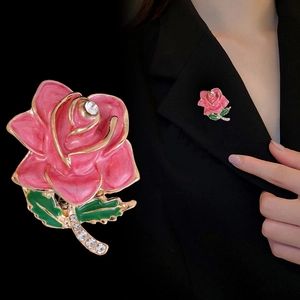 Pink enamel rose brooch with crystals on black blazer lapel, elegant floral pin jewelry