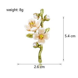 Green jasmine flower brooch with white enamel petals and crystal stamens, size 5.4x2.6cm