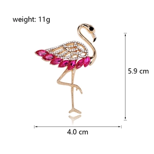 Sparkling rhinestone flamingo brooch with pink crystals and golden frame 5.9cm