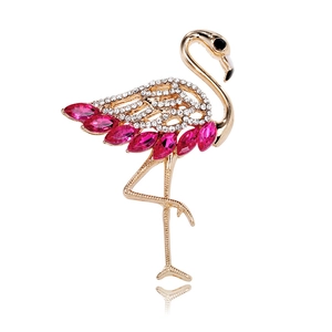 Elegant flamingo brooch with gold plating, white crystals and pink rhinestone accents