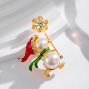 Broche de bonhomme de Noël avec perles blanches, émail rouge et cristaux scintillants