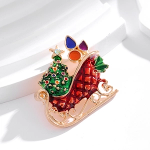 Spilla a forma di slitta di Natale con albero di strass e smalto rosso e dorato