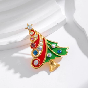 Christmas tree brooch with gold alloy outline, red and green enamel, and colorful rhinestones