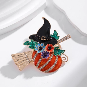 Halloween pumpkin witch brooch with colorful enamel and sparkling rhinestones on gold base