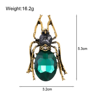Vintage crystal beetle brooch in antique gold with olive green gemstone, 5.3cm length