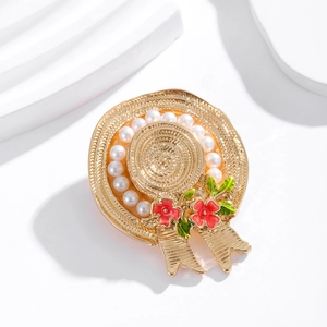 Elegant gold pearl maple hat brooch with red flowers and green leaves on white wave base
