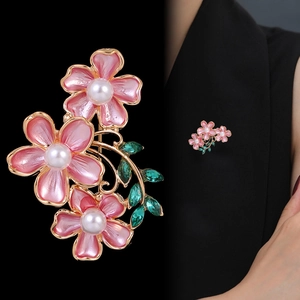 Elegant cherry blossom pearl brooch with pink petals and gold branch for suit lapels