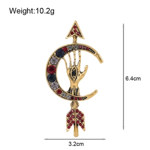 Vintage crescent moon and arrow brooch with palm evil eye and colorful rhinestones