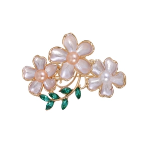 Elegant Chinese style floral brooch with pink pearl petals and green crystal leaves