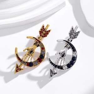 Vintage mystical moon and arrow brooches with crystal eyes in gold and silver finishes