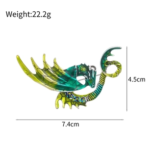 Broche dragon mythique en émail vert avec strass colorés et plaquage doré élégant