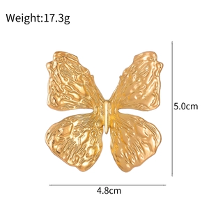 Golden 3D butterfly brooch with polished ripple texture for suits and coats