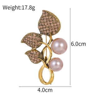 Elegant gold flower leaf brooch with purple pearls and brown crystals, size 6x4cm