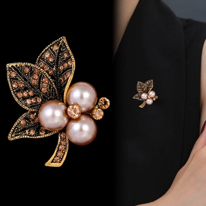 Vintage leaf brooch with champagne pink pearls and brown rhinestones on gold metal