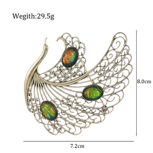Antique bronze peacock brooch with colorful iridescent gemstones, size 8.0cm by 7.2cm