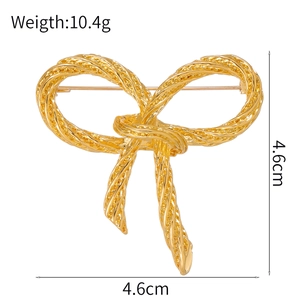 Vintage golden bow brooch with woven rope texture, 10.4g weight and 4.6cm size