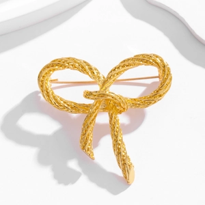 Vintage gold bow brooch with twisted rope texture and elegant knot design for women